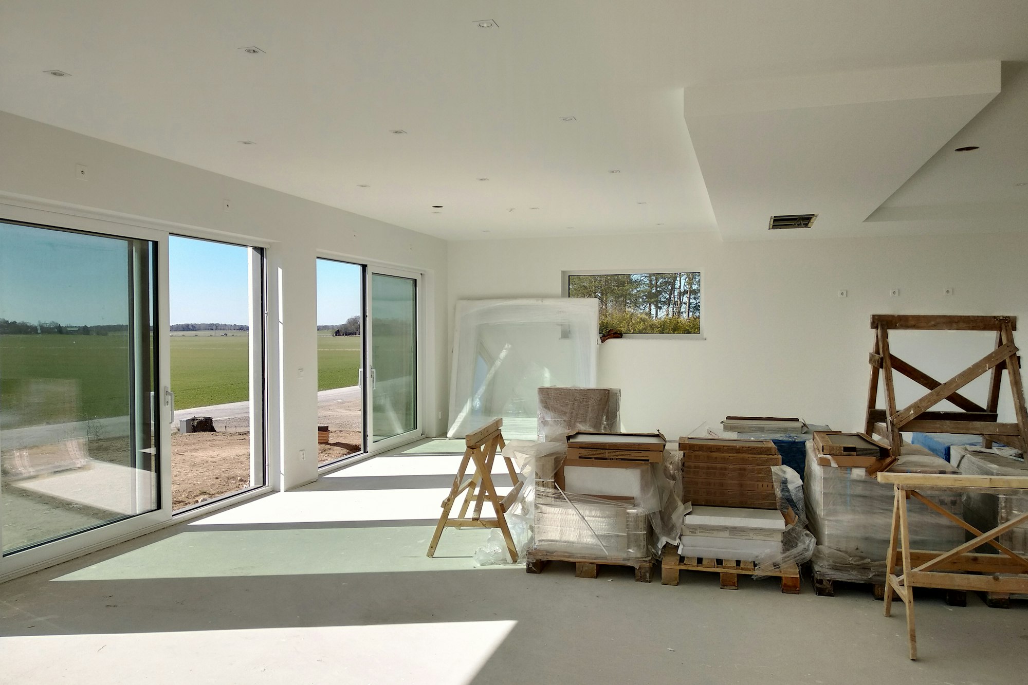 Interior of a house with big room under renovation works.